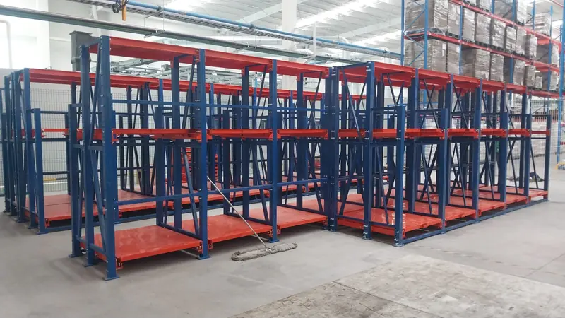 Mold & die rack. Mold & die rack with several levels of trays.