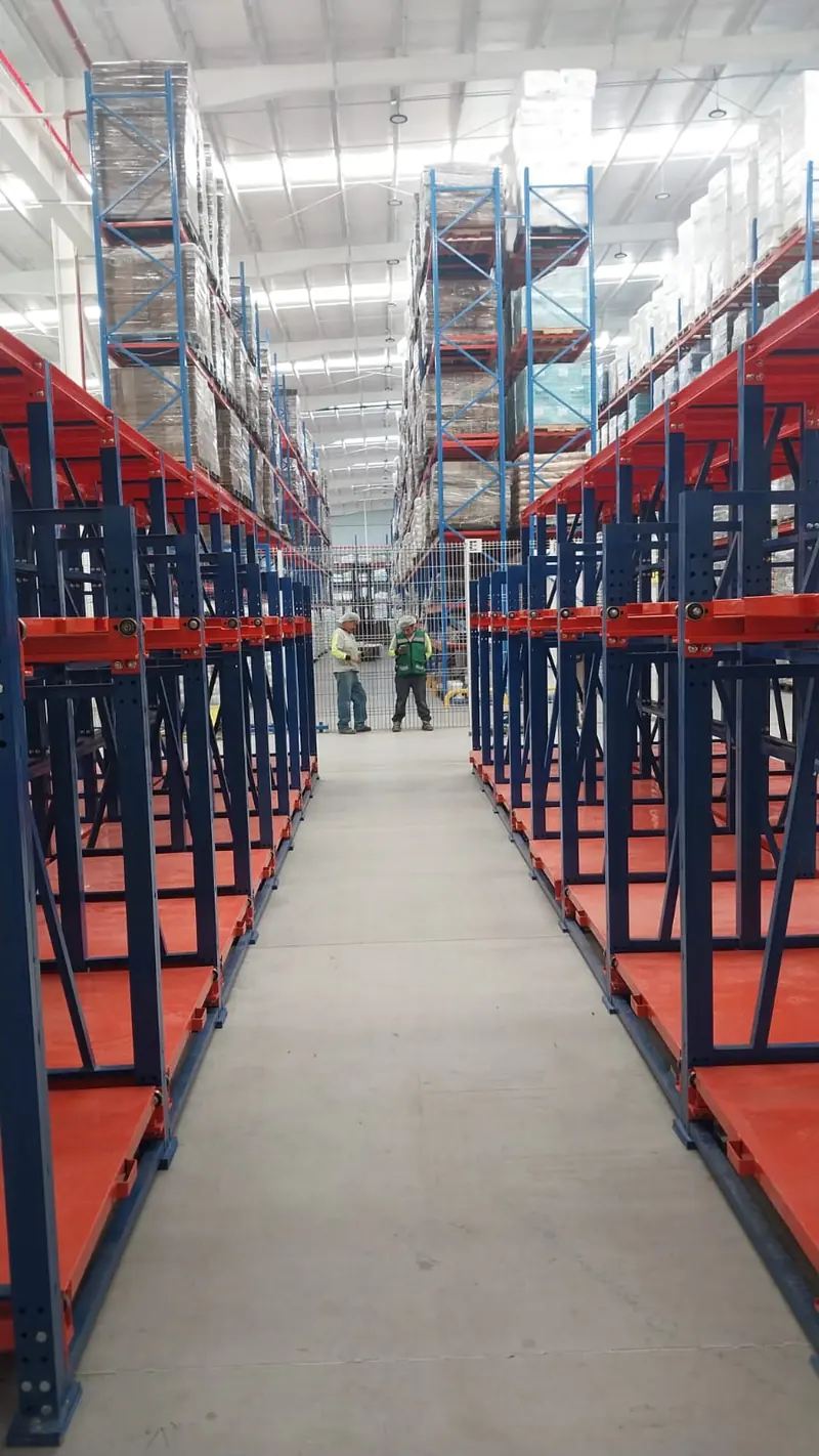 Mold & die rack. Aisle between rows of mold racks.