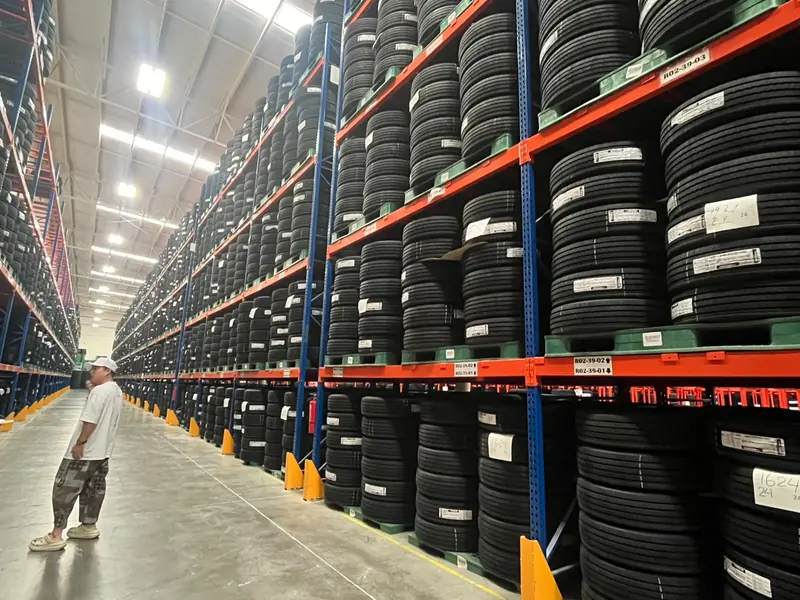 Selective pallet rack. Selective rack aisle with tire storage.
