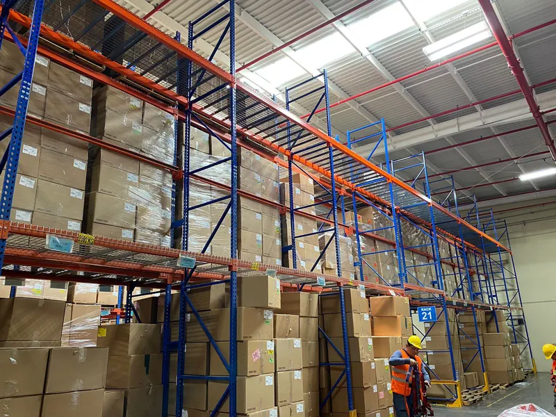 Selective pallet rack. Selective rack loaded with boxes in a storage warehouse.