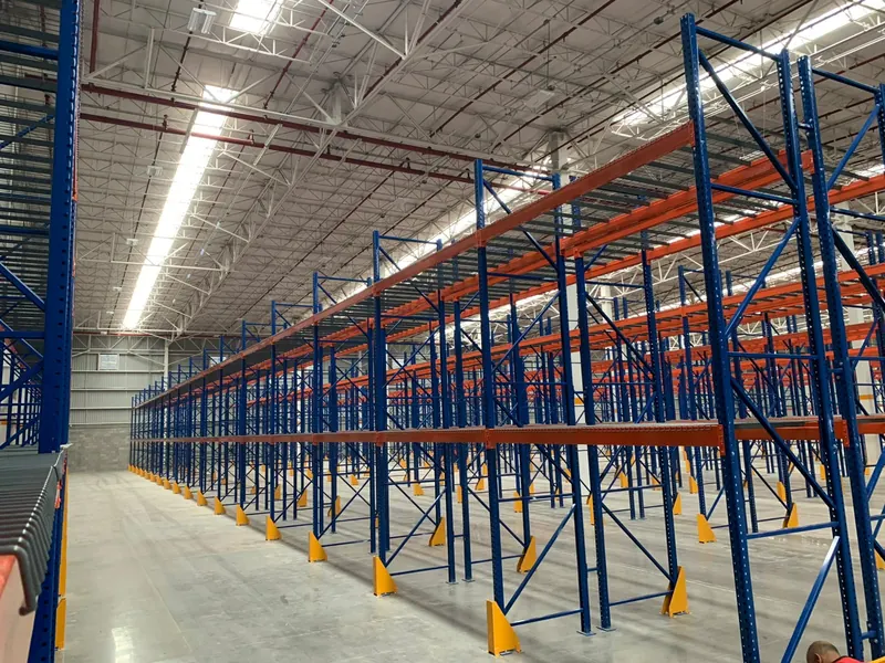Selective pallet rack. Very long row of selective racking.